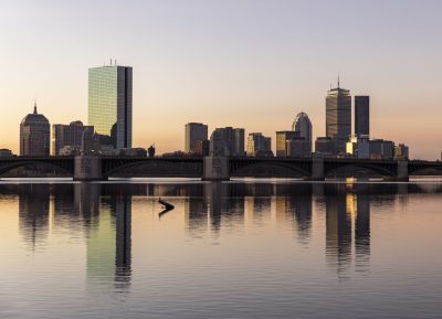 Buildings reflected in the water.