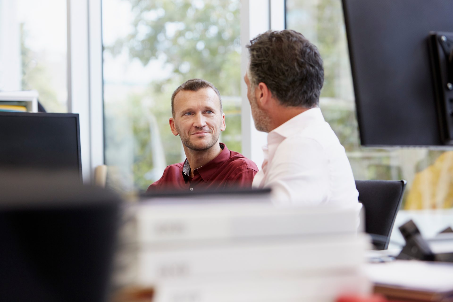 Two businessmen talking.